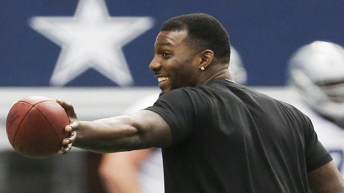
Cowboys receiver Dez Bryant watched a pre-practice video with the team in the stands, and then spent practice in street clothes on the sideline playing catch at the final minicamp practice on Thursday.
Dallas Cowboys wide receiver Dez Bryant looks on during the teams final practice in Arlington before training camp, Thursday, June 18, 2015. Special/Brandon Wade
