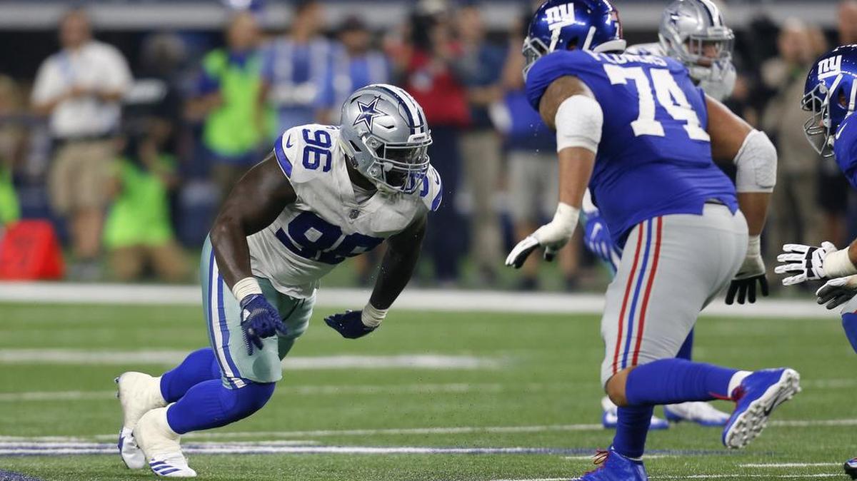Maliek Collins (96) won’t change despite penalty.