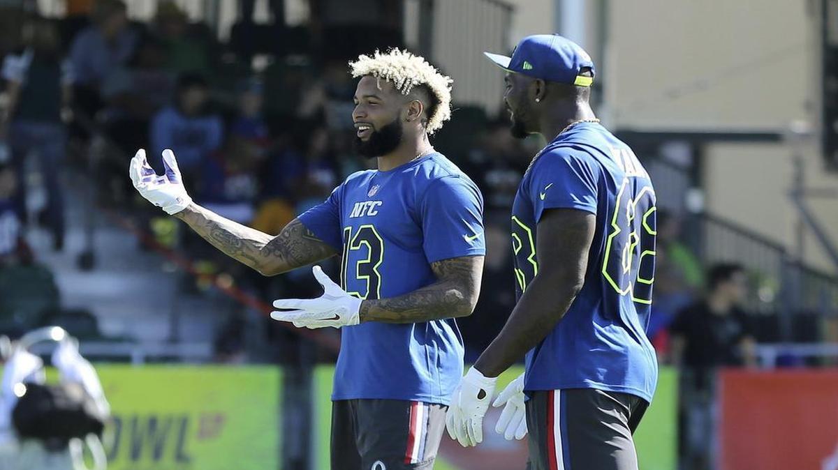 New York Giants wide receiver Odell Beckham Jr., left, Dallas Cowboys wide receiver Dez Bryant are close friends and were born on the same day. They will both be playing in the Pro Bowl Sunday.