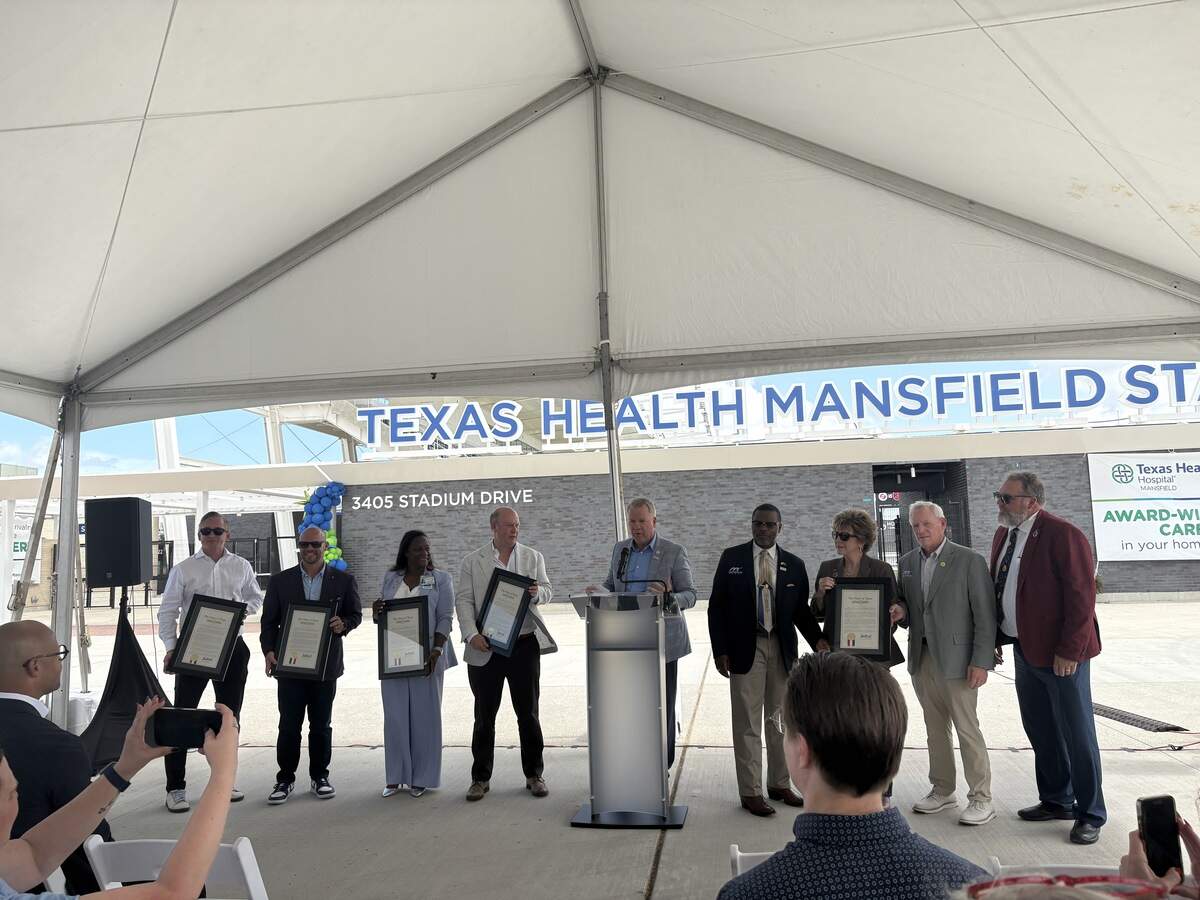 Officials at the ribbon-cutting ceremony for Texas Health Mansfield Stadium on Wednesday, July 1, 2026, in Mansfield.