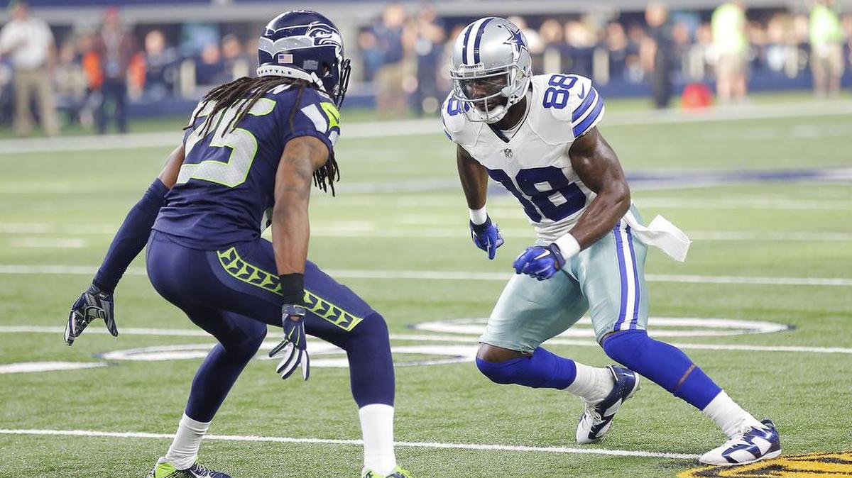 Cowboys receiver Dez Bryant (88) was stymied by Seahawks cornerback Richard Sherman (25) during Sunday’s game, making two catches for 14 yards.