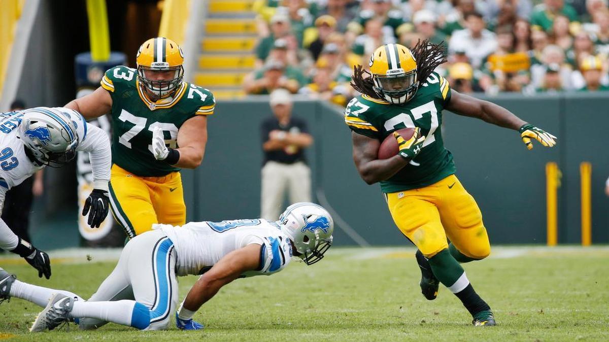 Green Bay Packers running back Eddie Lacy carries the ball during the second half against the Detroit Lions in Green Bay, Wis. Lacy tweaked his ankle in last week’s win over the New York Giants and his status is unknown for Sunday’s game.