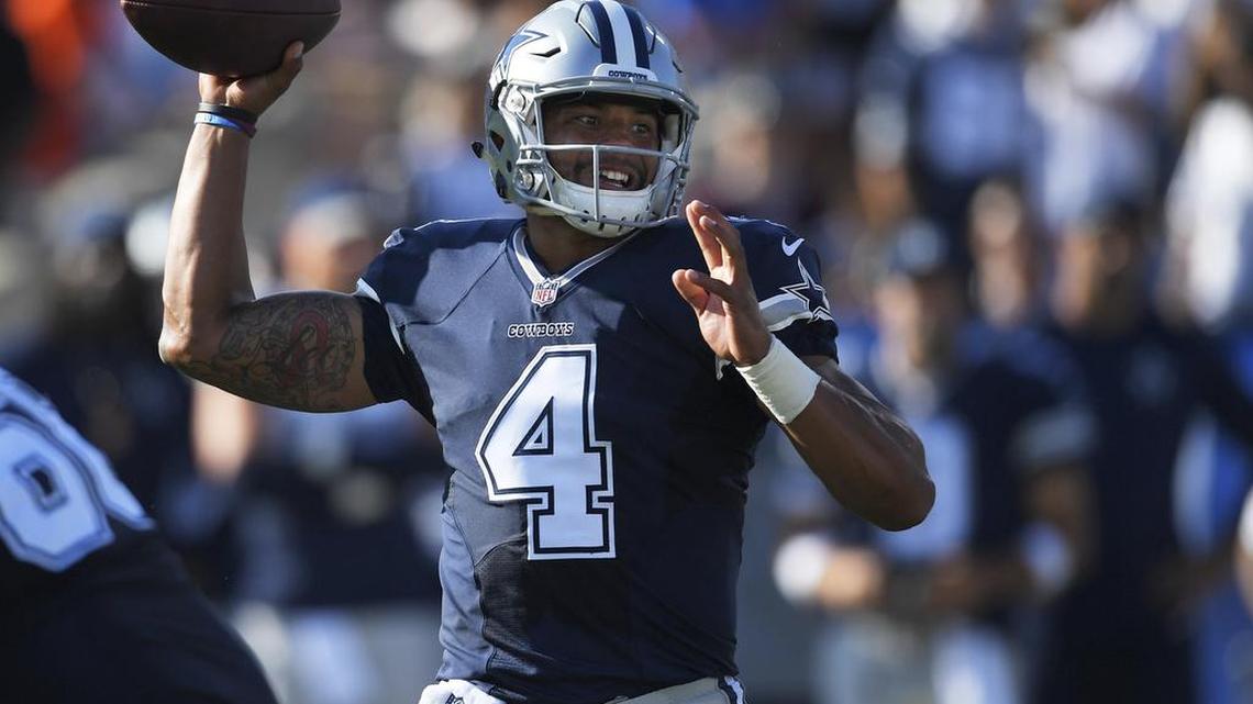 Dallas Cowboys quarterback Dak Prescott passes against the Los Angeles Rams in the first half of a preseason NFL football game, Saturday, Aug. 13, 2016, in Los Angeles.