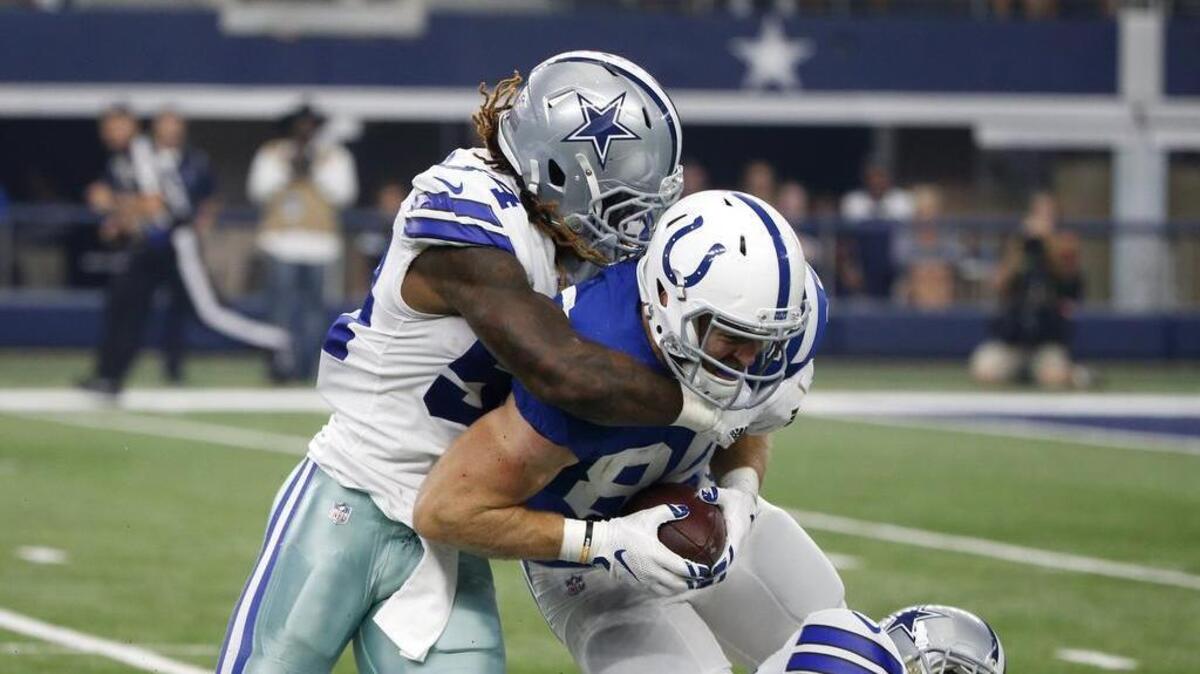 Dallas Cowboys linebacker Jaylon Smith (54) makes a stop against Indianapolis Colts tight end Jack Doyle (84). It was a play that had defensive coordinator Rod Marinelli gushing about Smith’s potential after missing all of last season with a devastating knee injury.