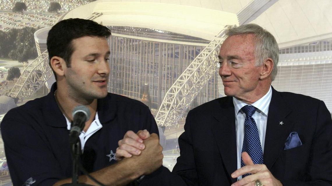 FILE - In this Oct. 30, 2007, file photo, Dallas Cowboys quarterback Tony Romo, left, shakes hands with team owner Jerry Jones during a news conference at team headquarters in Irving, Texas. Romo retired on Tuesday and Jones did right by him by giving him his out-right release, which allows him to return to game with any team if has a change of heart.