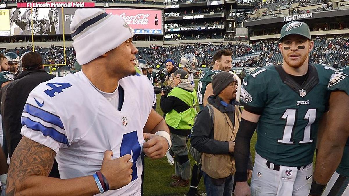 Rising young quarterbacks Dak Prescott, left, and Carson Wentz face off again Sunday night in Arlington.