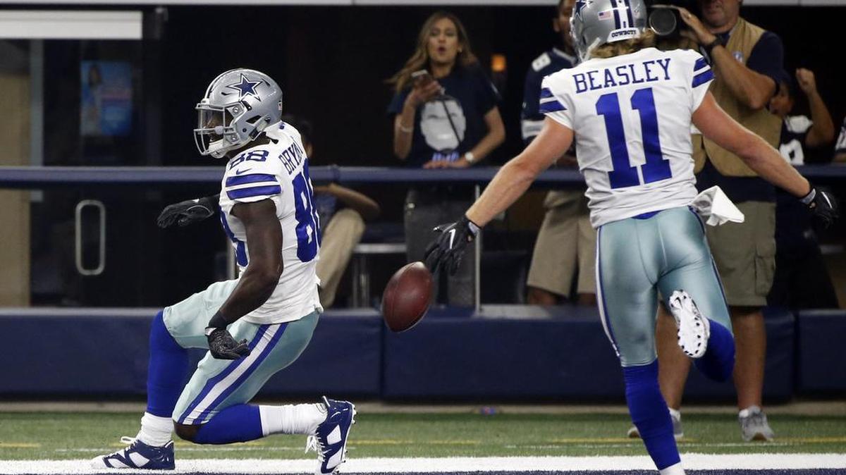 Dez Bryant (left) caught a TD pass on Saturday night.