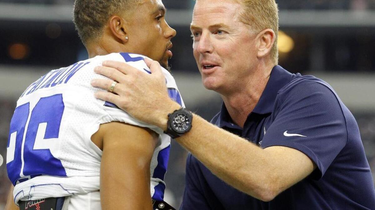 
Dallas Cowboys coach Jason Garrett, right, knows he has a rising star in second-year cornerback Tyler Patmon.
