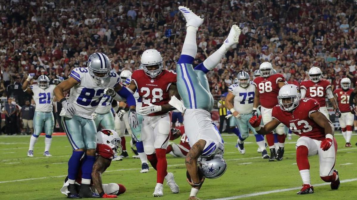 Dallas Cowboys quarterback Dak Prescott dives for a touchdown in the second quarter.