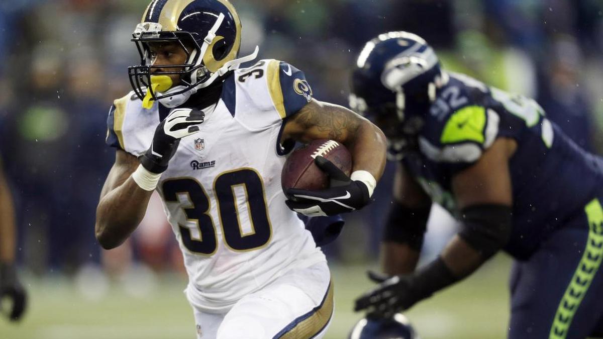 St. Louis Rams' Todd Gurley lead all rookies in rushing yards (1,106) and rushing touchdowns (10).