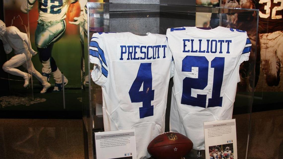 Dak Prescott and Ezekiel Elliott each have a jersey on display in Canton, Ohio, along with a game ball from last week.