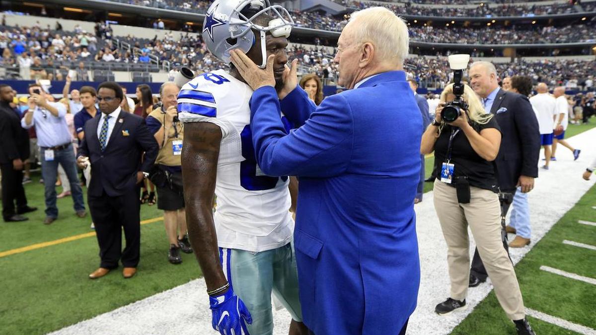 Dallas Cowboys wide receiver Dez Bryant (88) talks to team owner Jerry Jones before an NFL football game against the New York Giants on Sunday Sept. 11, 2016, in Arlington, Texas.