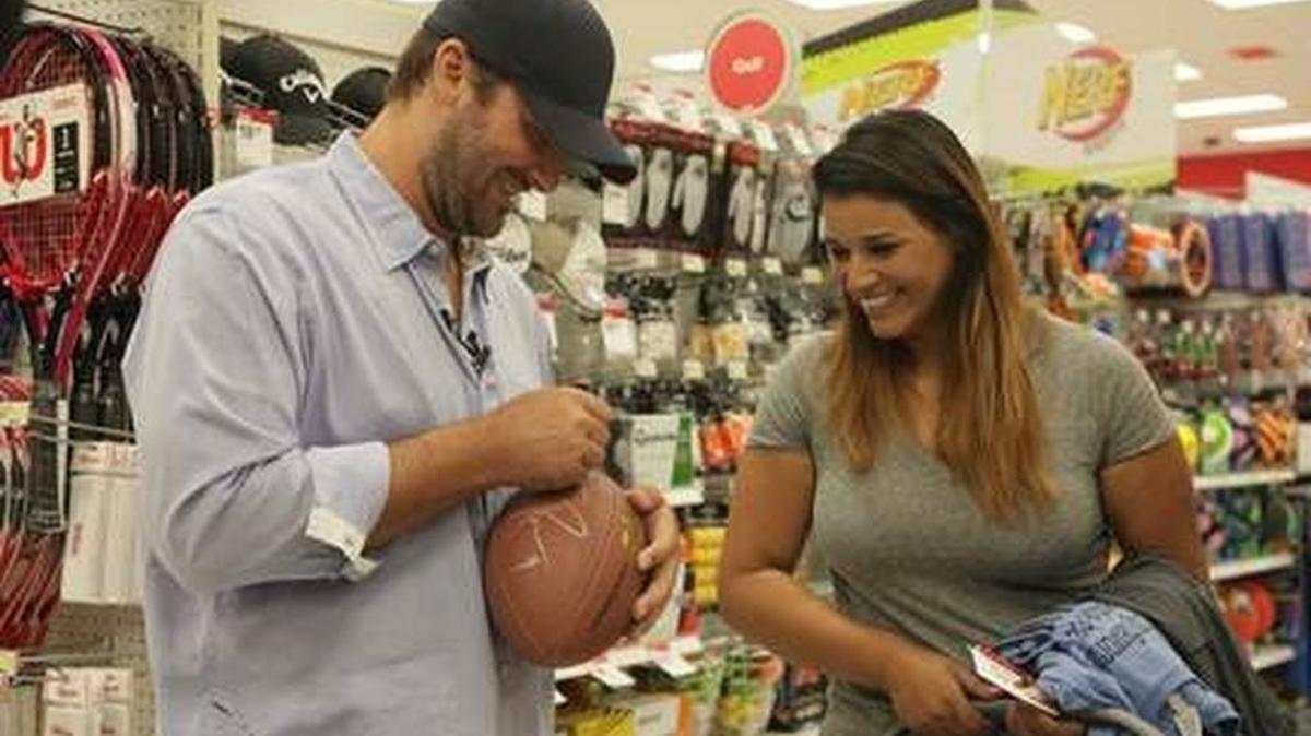 Dallas Cowboys quarterback Tony Romo surprised guests at the Cityplace Market Target store in Dallas to help them shop for last minute Father’s Day gifts. Father’s Day is Sunday.