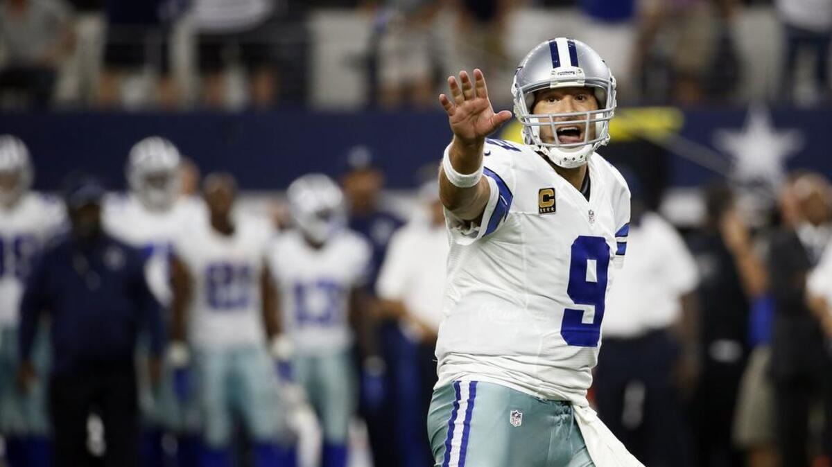 
Tony Romo (9) led the Cowboys to a comeback victory over the Giants in the season opener.
