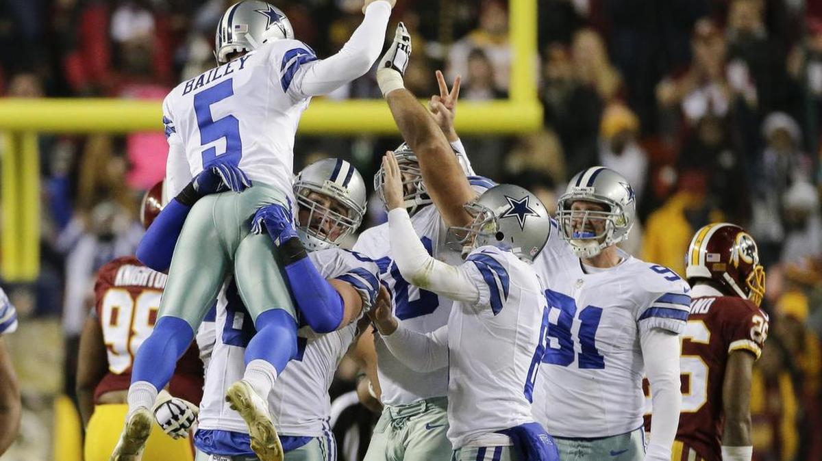 Dallas Cowboys kicker Dan Bailey celebrates his game-winning, 54-yard field goal with his teammates. The Cowboys beat Washington 19-16 on Bailey’s kick with nine seconds left in the game.