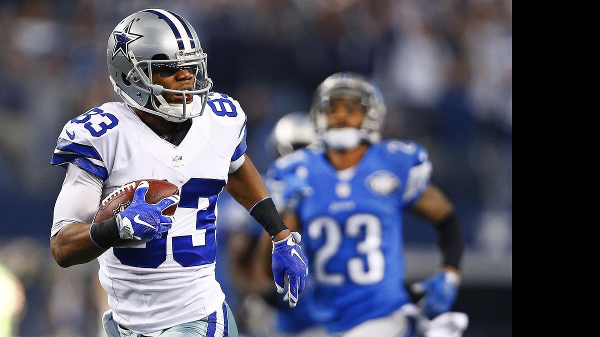 
Terrance Williams, shown against the Lions, misses Dez Bryant at the off-season workouts but knows the All-Pro will return ready.
