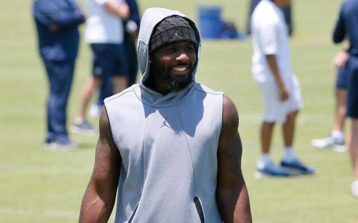 Receiver Dez Bryant, right, who is still recovering from foot and ankle surgeries, isn’t likely to get fully involved in practice until training camp in late July.