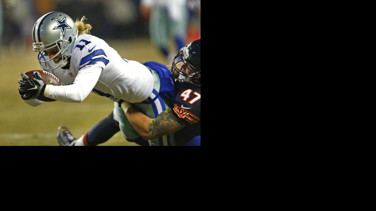 
Cowboys receiver Cole Beasley stretches for a 13-yard touchdown catch, the first of his two scores on the night. Beasley has 10 catches for 149 yards over the past three weeks.


