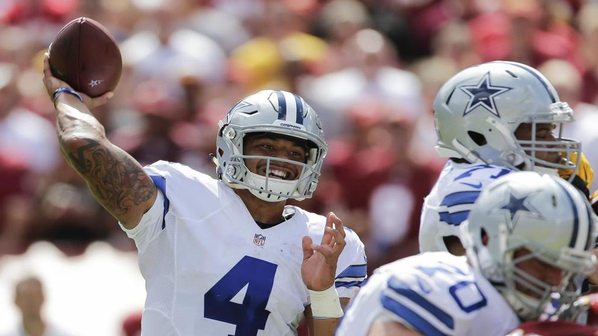 Dallas Cowboys rookie quarterback Dak Prescott scored his first NFL touchdown on a 6-yard scramble in the third quarter.