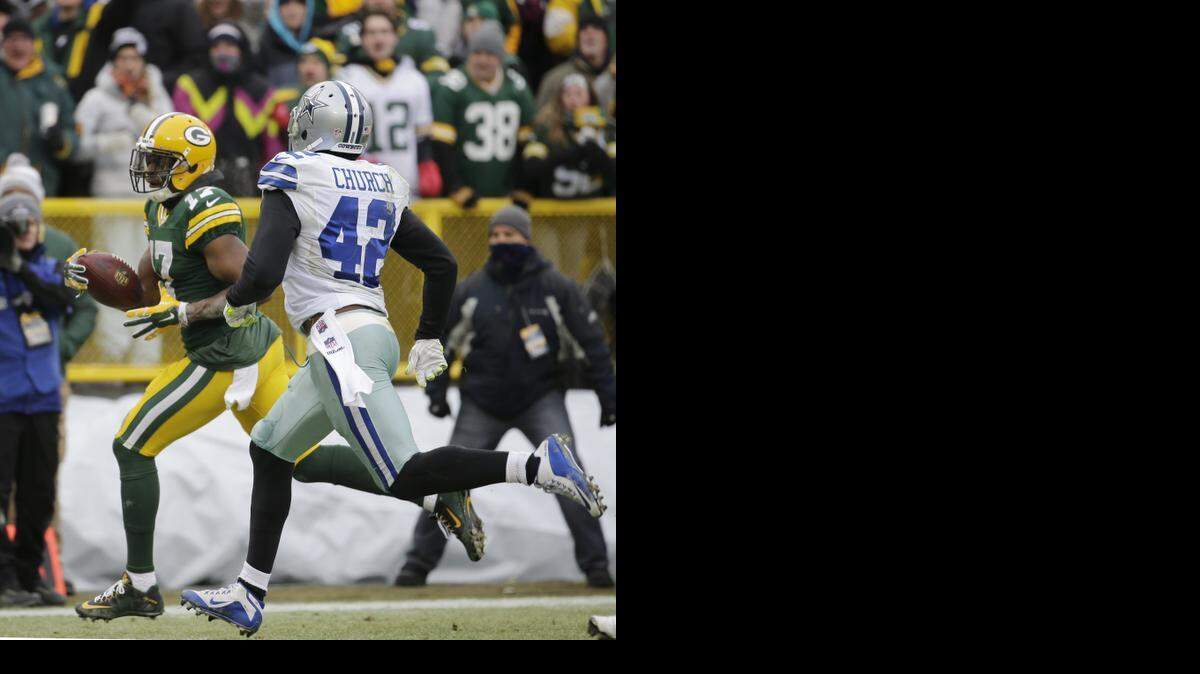 
Packers WR Davante Adams, left, cut the deficit to 21-20 in the third quarter with a 46-yard touchdown catch.
 
