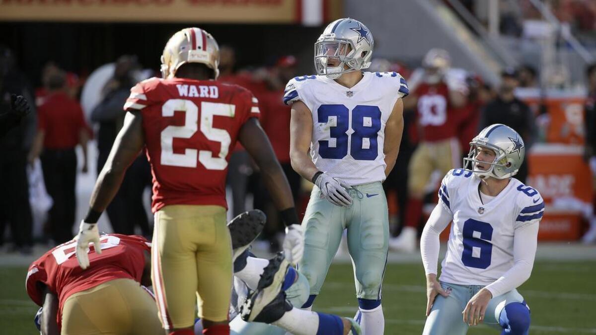 Cowboys strong safety Jeff Heath kicks a PAT in Sunday’s 40-10 win at San Francisco. Heath is the first non-kicker or punter to make at least two PATs in a game since 1980.