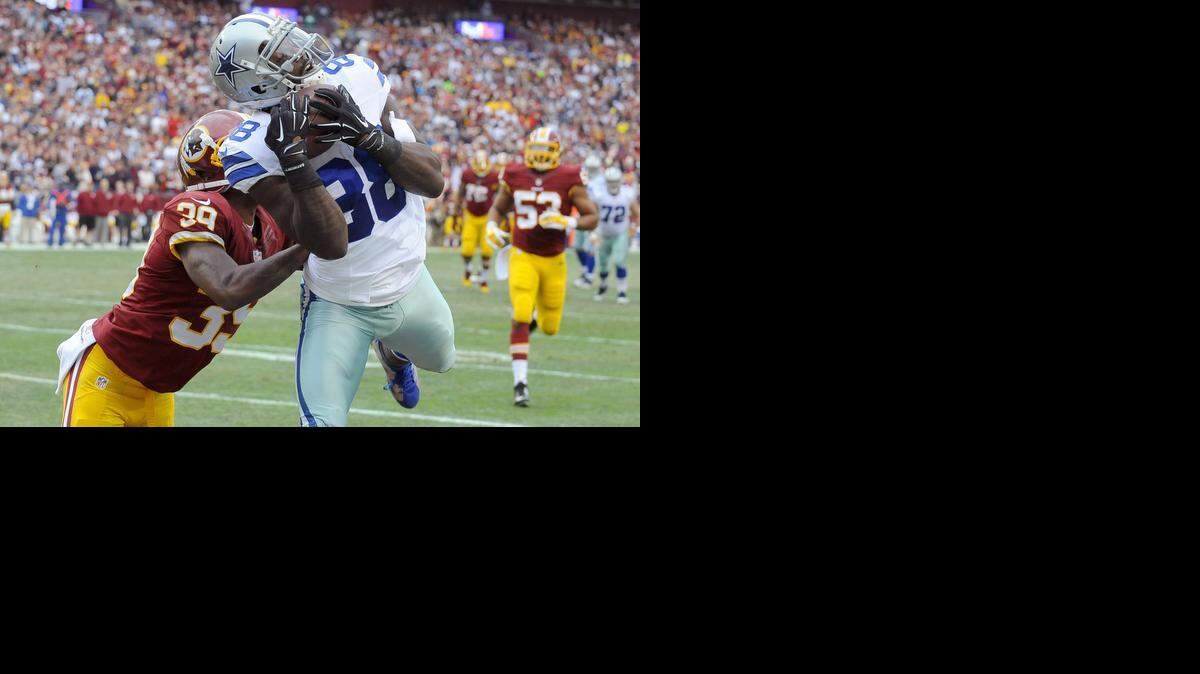 
Cowboys receiver Dez Bryant catches his franchise-record 16th touchdown this season.


