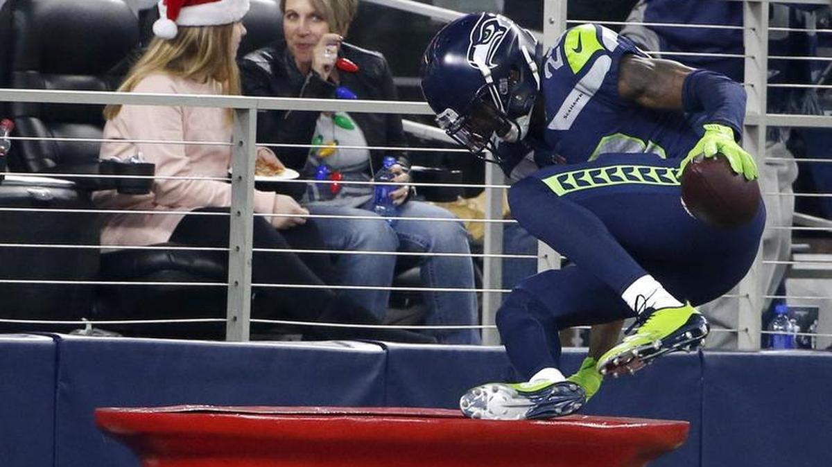 Justin Coleman jumped in the oversized Salvation Army kettle on Sunday.