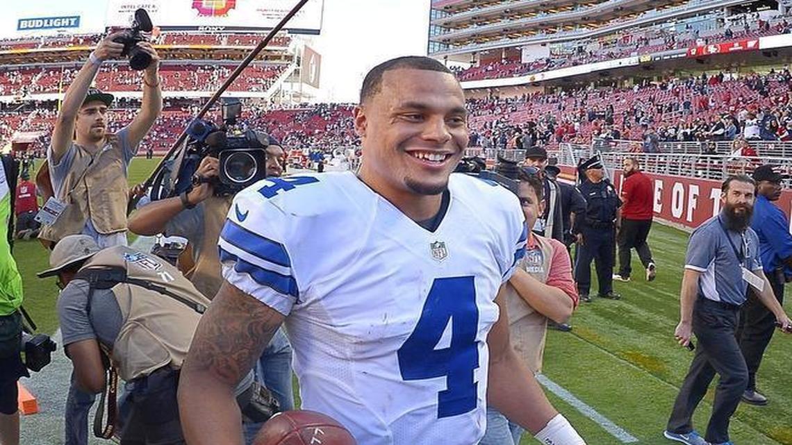 Dallas Cowboys quarterback Dak Prescott walks off the field with a game ball Sunday as the Dallas Cowboys beat the San Francisco 49ers 24-17 at Levi’s Stadium in Santa Clara, Calif. He has thrown 131 passes without an interception and has three wins and a one-point loss in his first four games.
