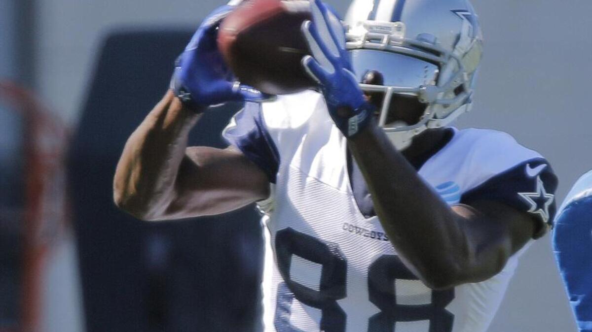 Cowboys receiver Dez Bryant (88) catches a ball in practice Wednesday.