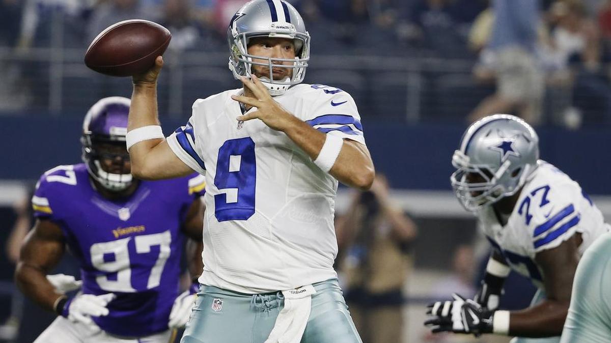 
Dallas Cowboys quarterback Tony Romo looks to pass against the Minnesota Vikings during the first half. Romo was 5 of 8 passing with two touchdowns. 
