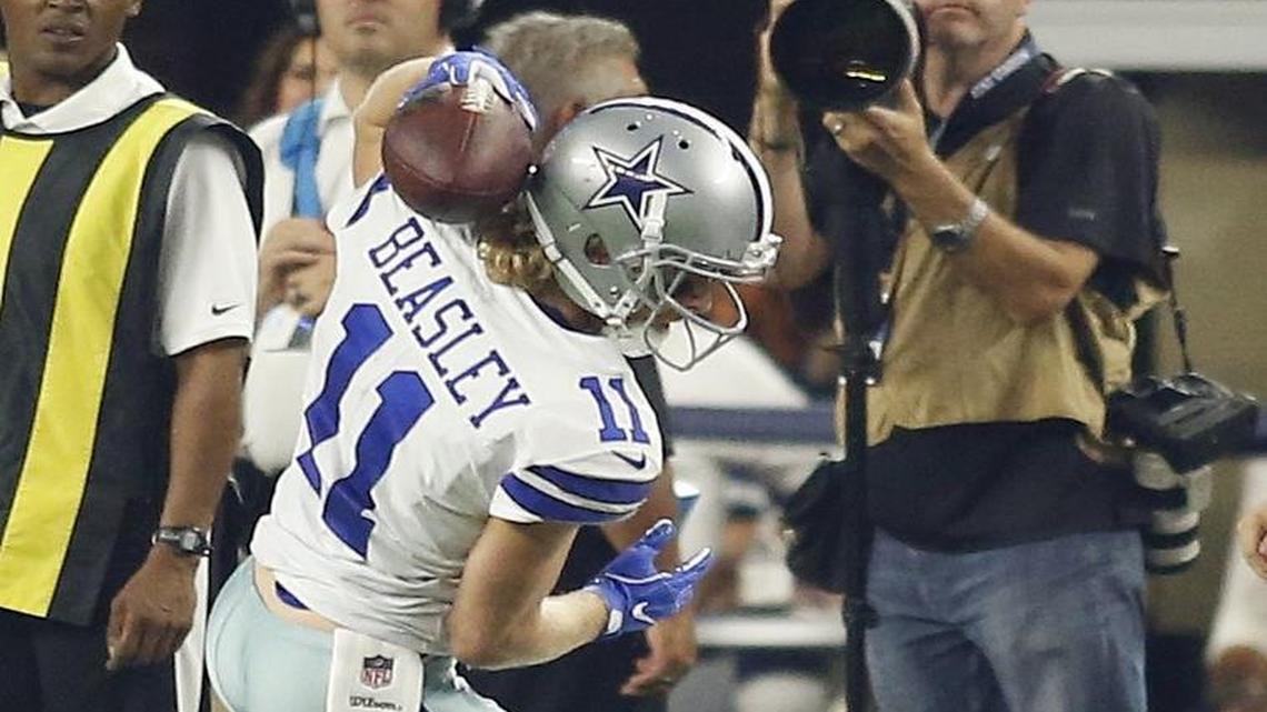Cowboys wide receiver Cole Beasley caught a pass behind his helmet in the second half of the season opener against the Giants Sunday night at AT&T Stadium.