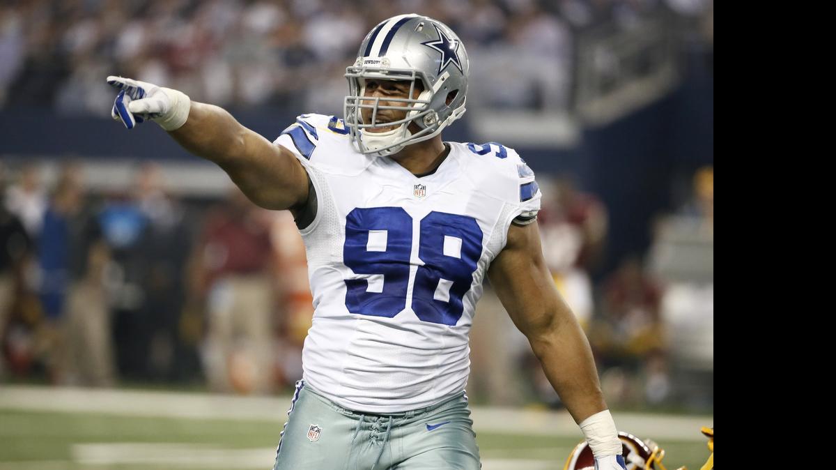 
Tyrone Crawford, shown celebrating a sack against the Redskins last year, has a defined position now.
