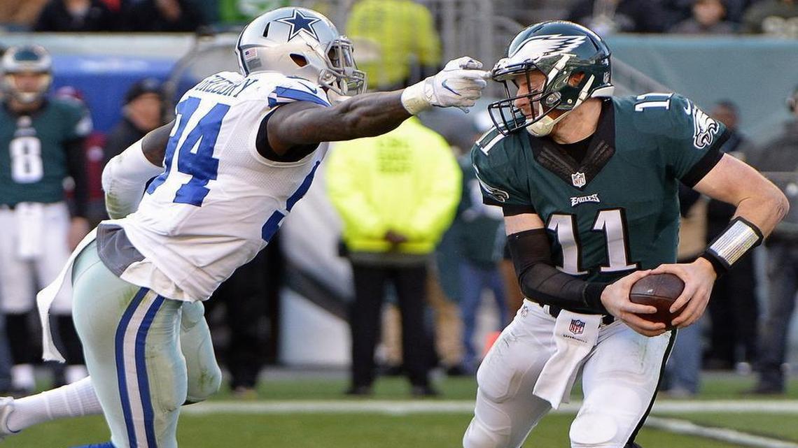 Cowboys defensive end Randy Gregory was called for a face mask penalty on Eagles quarterback Carson Wentz on this play, but also recorded his first career sack Sunday in Philadelphia.