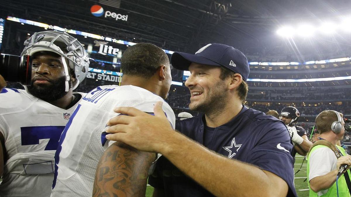 Tony Romo congratulates Dak Prescott after the Dallas Cowboys’ win against Chicago. The Cowboys are 5-1 without Romo, but he’ll be returning soon.
