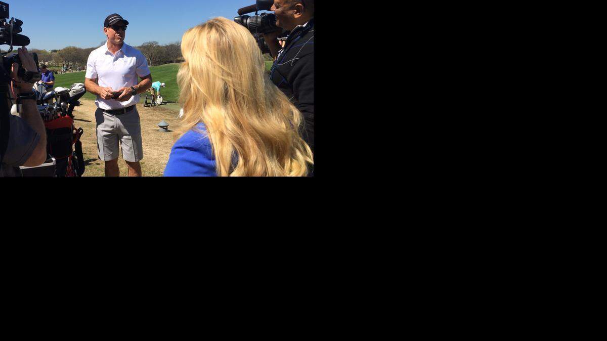 
Troy Aikman speaks to the media at a golf event Monday.
