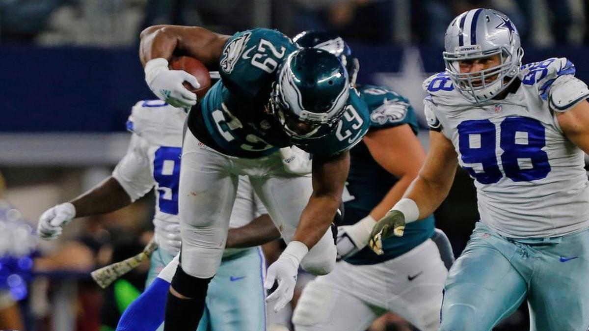 Eagles running back DeMarco Murray (29) leaps over a Cowboys’ defense that hasn’t been able to rise to the challenge this season.