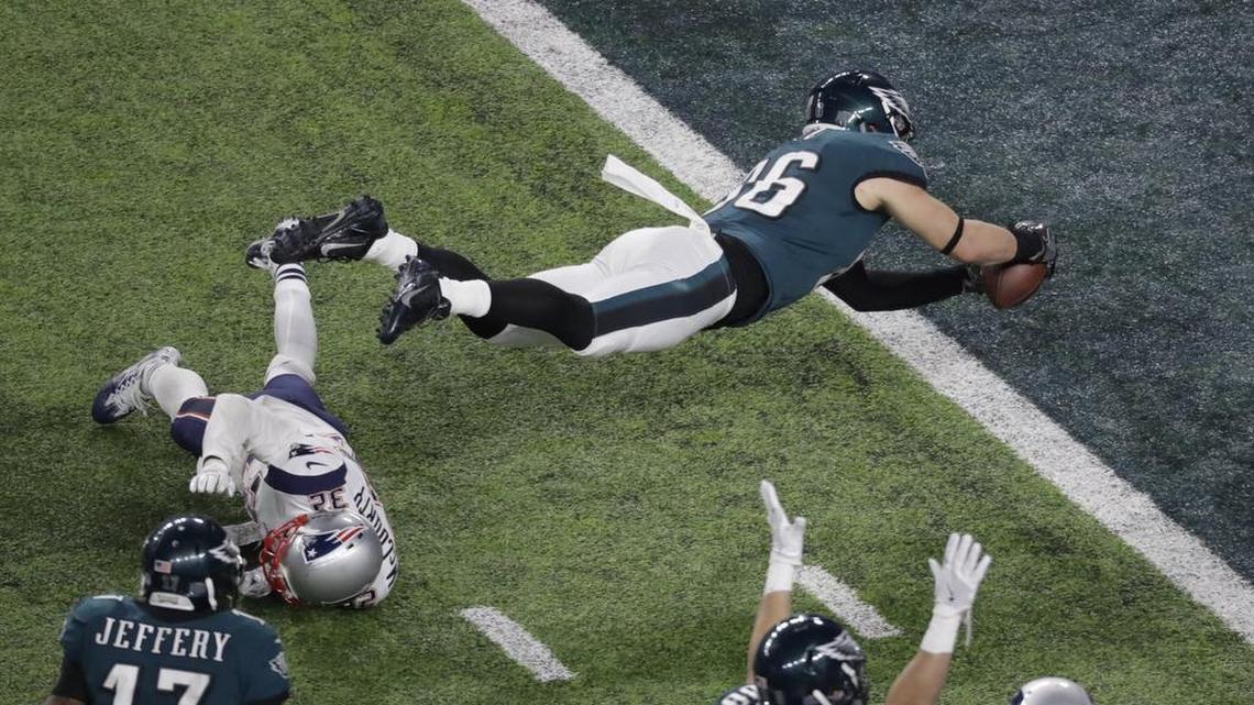 Eagles tight end Zach Ertz scores past Patriots free safety Devin McCourty late in Super Bowl 52 against the Patriots.
