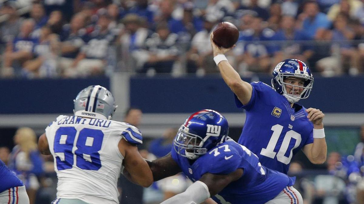 New York Giants quarterback Eli Manning threw three touchdowns against the Dallas Cowboys.