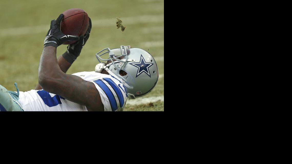 
Dallas Cowboys wide receiver Dez Bryant makes a juggling, would-be catch late in the fourth quarter against Green Bay in the NFC Divisional playoffs. The play was ruled a catch, but was overturned via instant replay.
