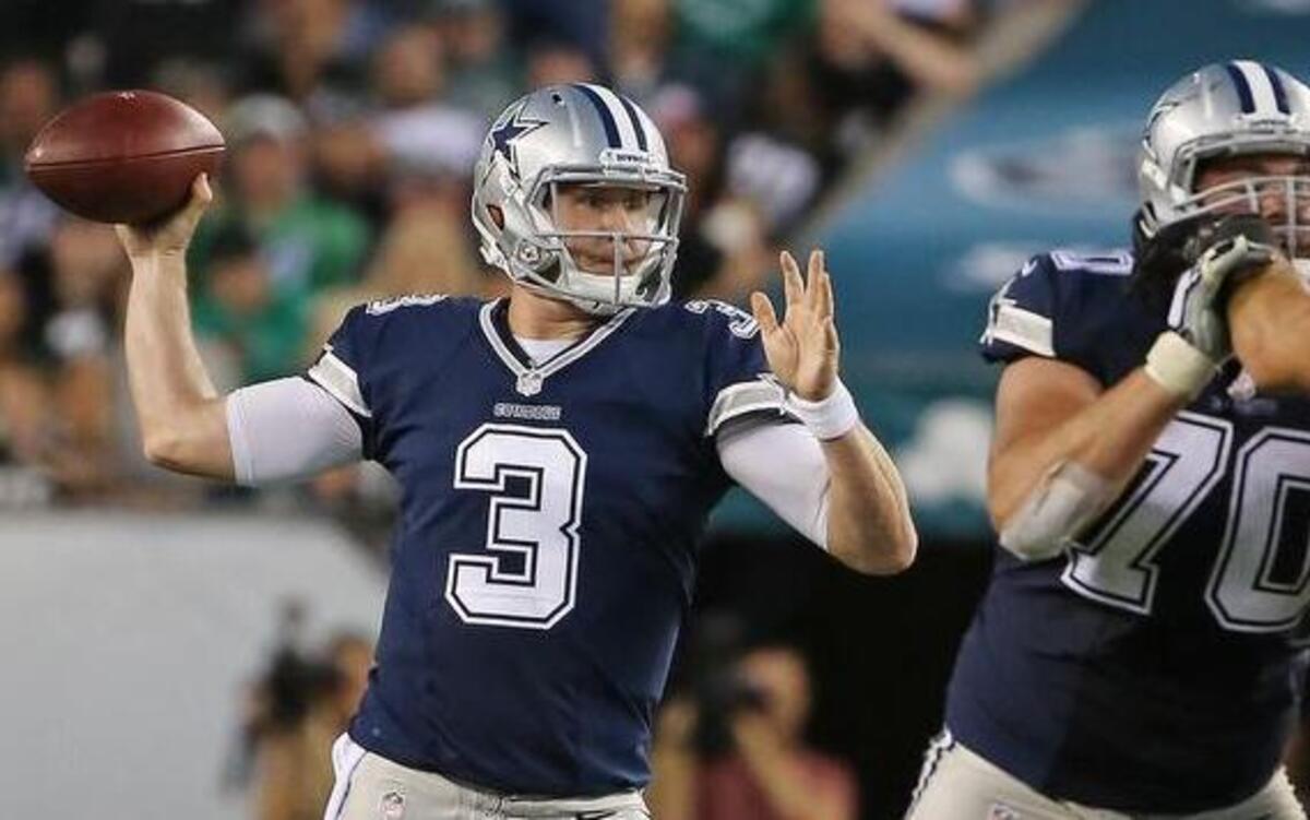 
Brandon Weeden, left, was 7-for-7 passing in his relief to Tony Romo on Sunday against the Eagles.

