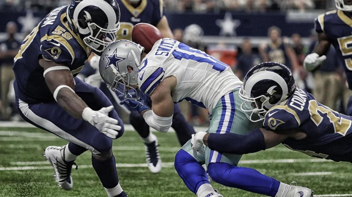 Ryan Switzer fumbles a punt during Sunday’s game.