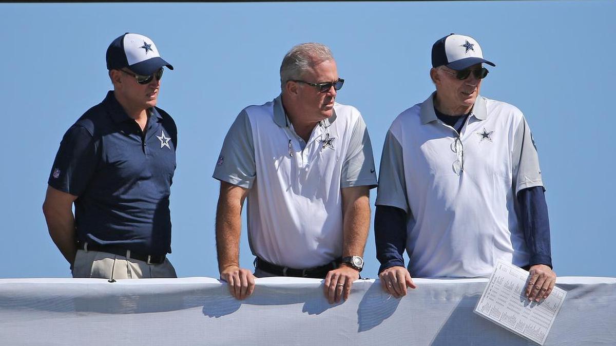 
Dallas Cowboys executives Jerry Jones, Jr., Stephen Jones and Jerry Jones (right) watch practice from the tower in the middle of the practice field. 

