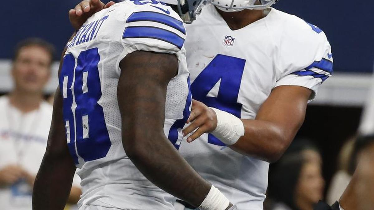 Cowboys quarterback Dak Prescott, right, hooked up with receiver Dez Bryant for two touchdowns Sunday against the Ravens.