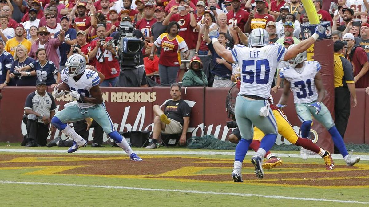 Cowboys safety Barry Church (42) intercepted Kirk Cousins in the end zone in the fourth quarter.