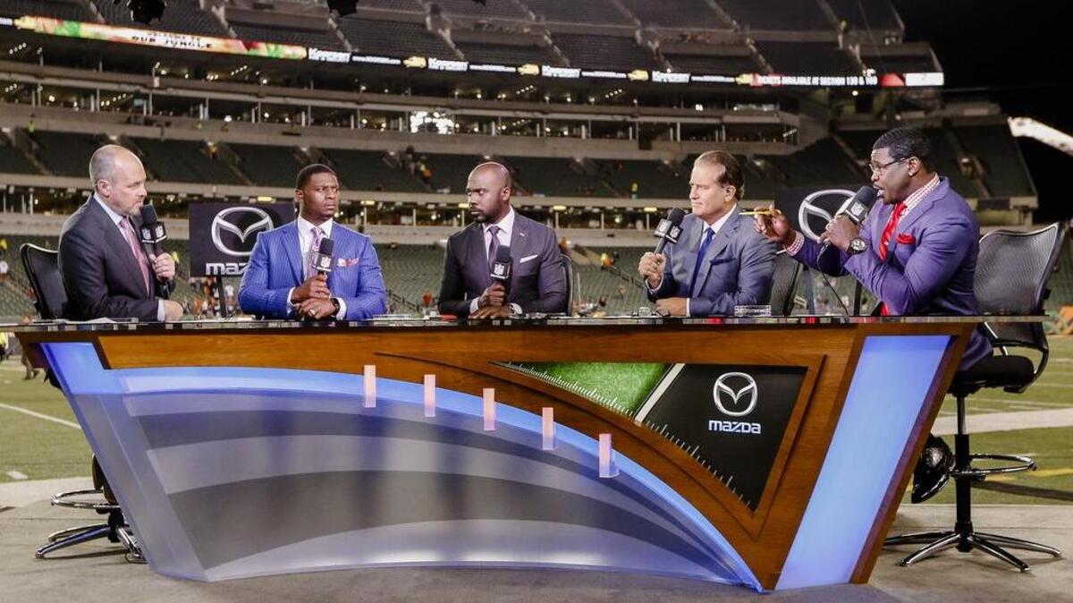 Former Cowboys receiver Michael Irvin, far right, plans to confront former TCU running back LaDainian Tomlinson, second from left, during the NFL Network pregame show Thursday night for saying Cowboys running back Ezekiel Elliott quit on his team last Sunday.