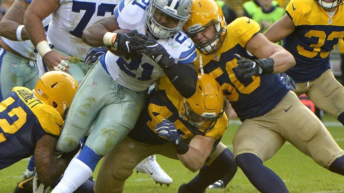 Cowboys running back Ezekiel Elliott (21) is off to a record-setting start.