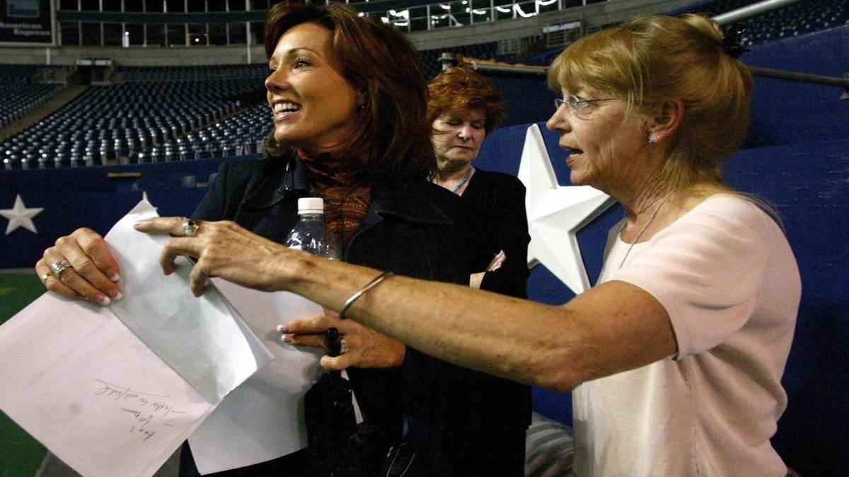 Dallas Cowboys Cheerleaders director Kelli Finglass, left, and former director Suzanne Mitchell molded the group into one of the most recognized in the world. Suzanne Mitchell died this week at the age of 73.