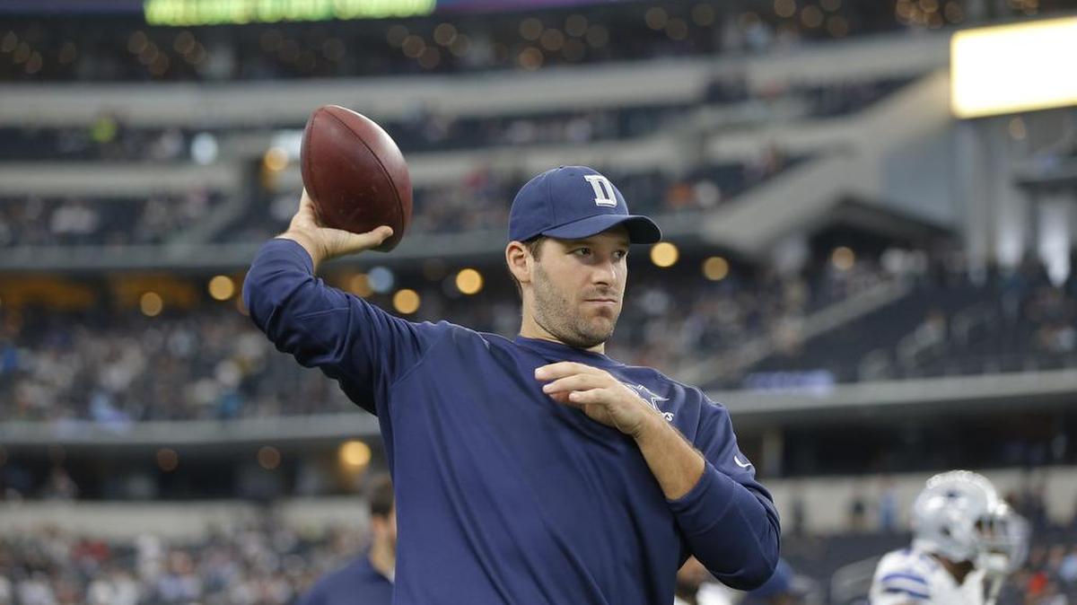 Injured Cowboys quarterback Tony Romo throws before Sunday’s game against the Seahawks. He is eligible to return to practice this week.