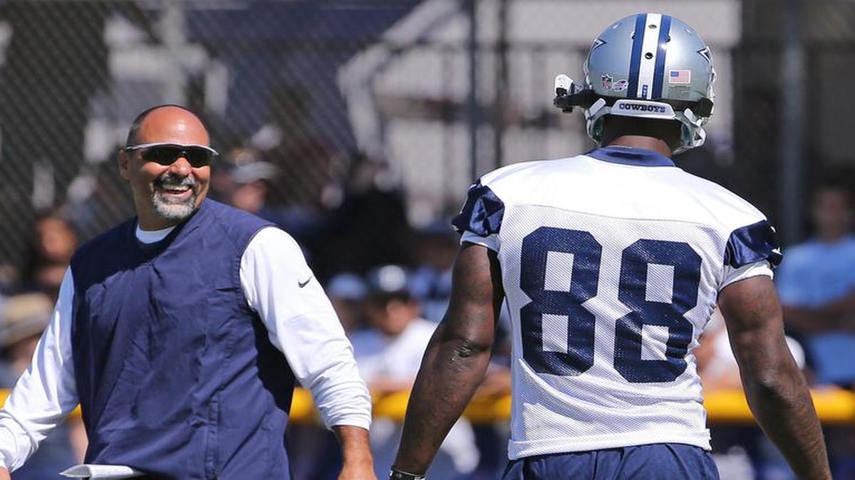 
Dallas Cowboys special teams coach Rich Bisaccia laughs with wide receiver Dez Bryant (88) during practice Friday.
