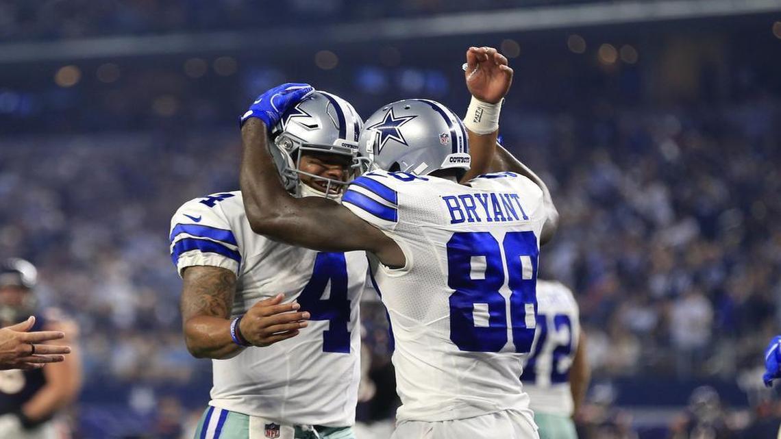 Dak Prescott, left, celebrates with Dez Bryant after he connected with the receiver on a 17-yard touchdown pass.